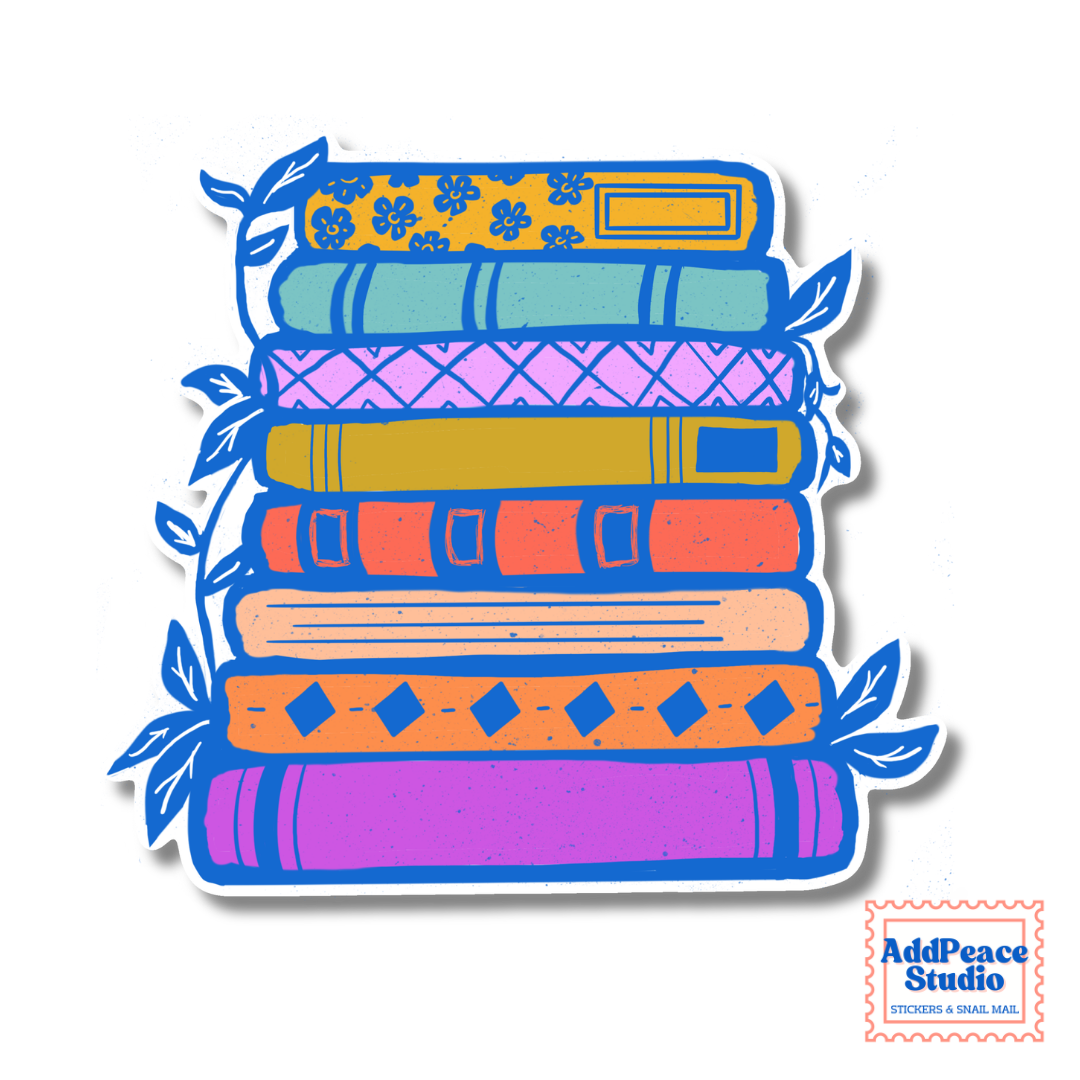 A die-cut sticker featuring a colorful stack of patterned books with blue leaves on the sides, shown on a white background with a small AddPeace Studio logo in the bottom right corner.