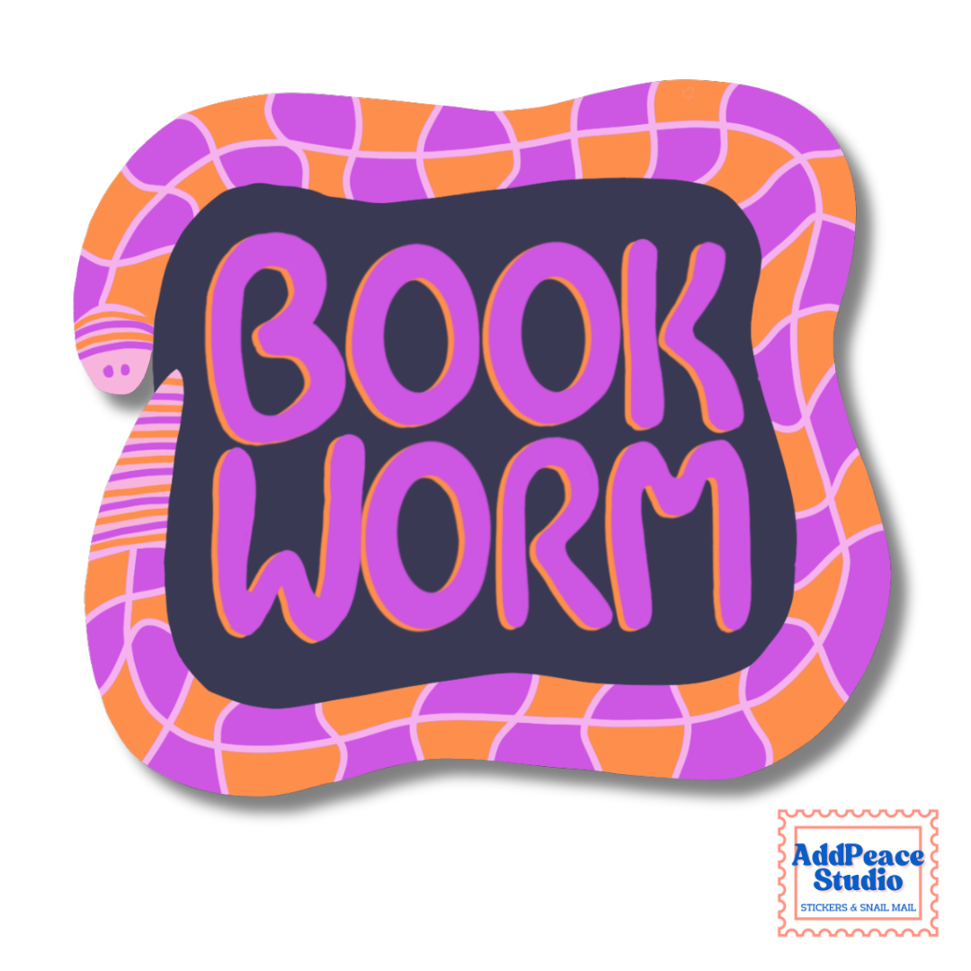A colorful sticker design featuring the words 'BOOK WORM' in purple bubble letters with orange outlines on a dark navy background. The sticker is framed by an orange and purple illustrated worm.