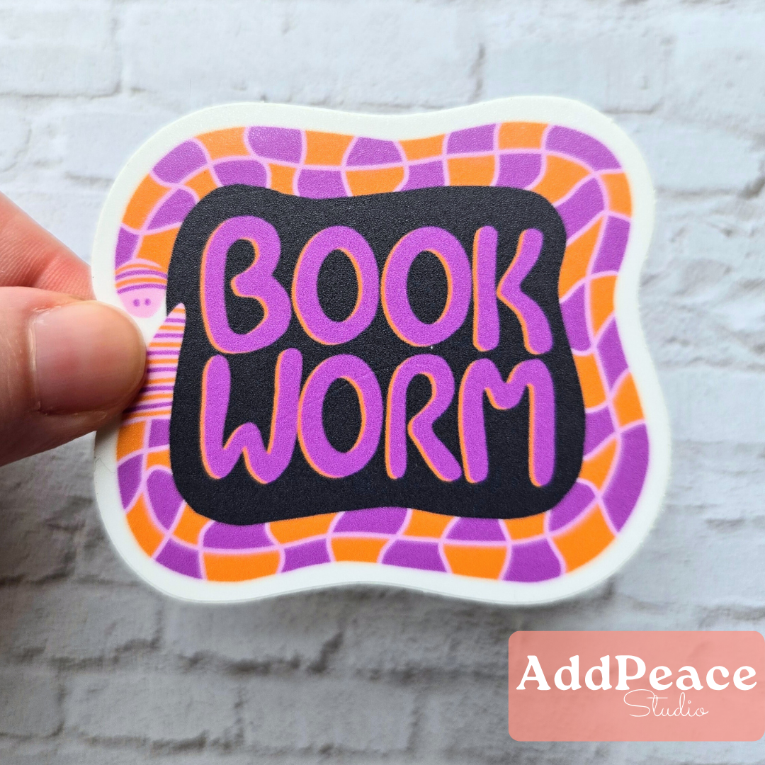 Illustrated worm wrapped around the words Book Worm, 2.5 inch vinyl sticker