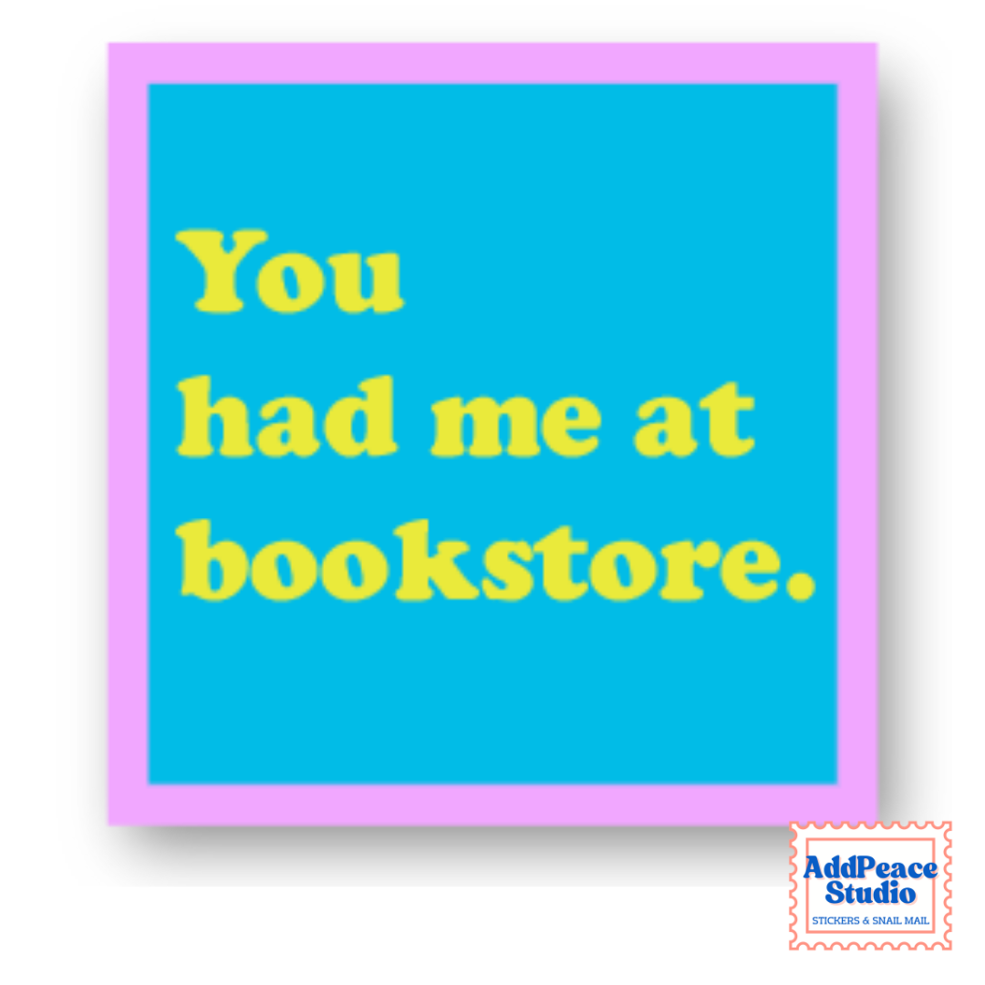 A square sticker with a bright blue center, yellow text reading 'You had me at bookstore.', and a lavender border, shown on a white background with a small AddPeace Studio logo in the bottom right corner.