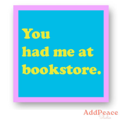 Framed quote sticker 'You had me at bookstore.' on a blue background with a purple border, featuring the brand 'AddPeace Studio'.