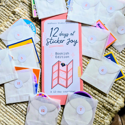 12 days of Sticker Joy bookish edition with envelopes on a textured surface
