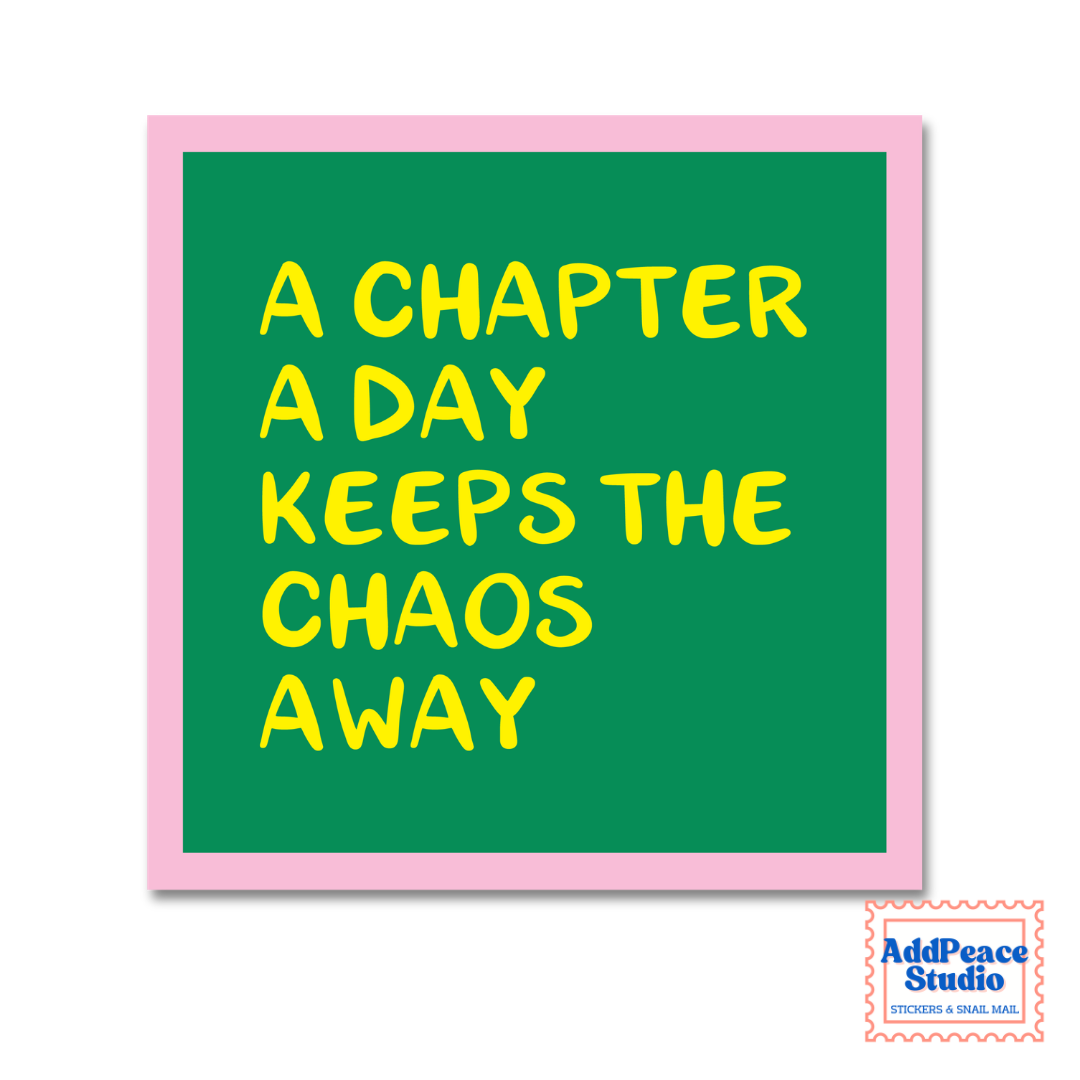 A square sticker with a green background and pink border, featuring the motivational quote 'A CHAPTER A DAY KEEPS THE CHAOS AWAY' in yellow text. A small 'AddPeace Studio' brand logo is visible in the bottom right corner.