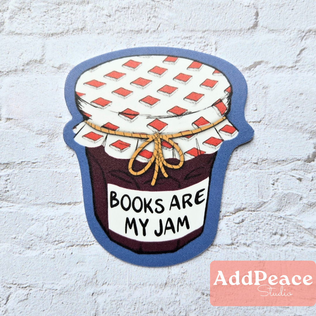 Sticker of a jam jar with 'Books are my jam' text on a white brick background, featuring the AddPeace Studio logo.