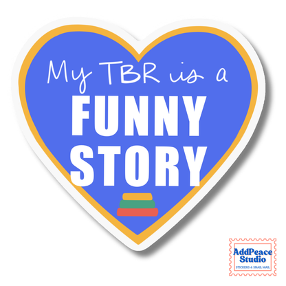 A heart-shaped sticker with a blue center, white text reading 'My TBR is a FUNNY STORY,' a gold inner border, and a white outer border on a light gray background. A small AddPeace Studio logo appears in the bottom-right corner.
