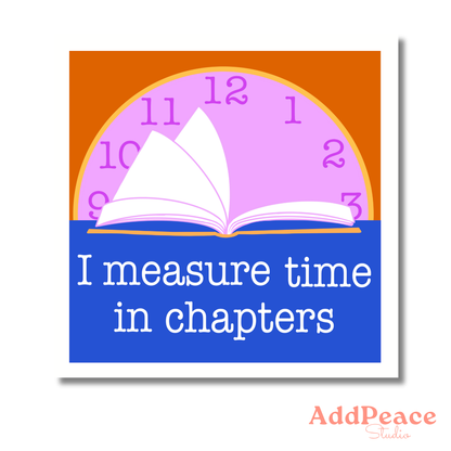 Clock with an open book design and text 'I measure time in chapters' on a colorful background.