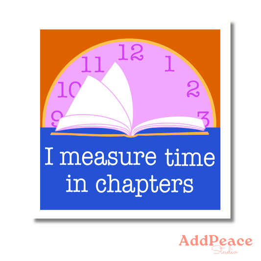 Clock with an open book design and text 'I measure time in chapters' on a colorful background.