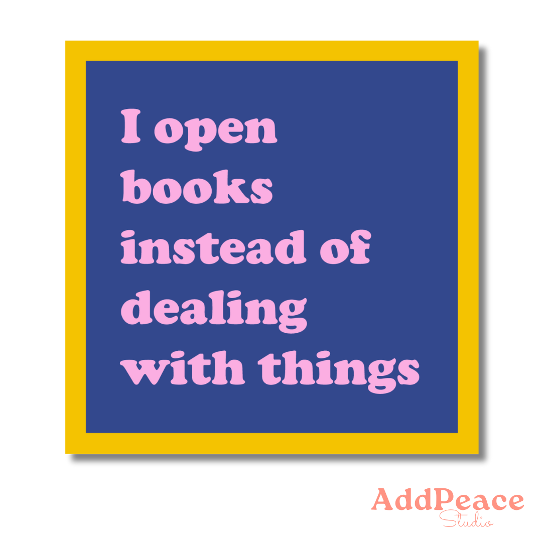 Framed quote 'I open books instead of dealing with things' on a blue background with yellow border.
