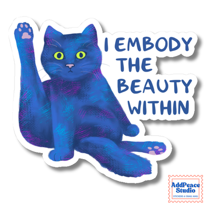 A die-cut vinyl sticker featuring a stylized blue cat with yellow eyes and purple textured accents, sitting next to the text 'I EMBODY THE BEAUTY WITHIN' in blue lettering with a white outline. A small 'AddPeace Studio' logo is visible in the bottom right corner.