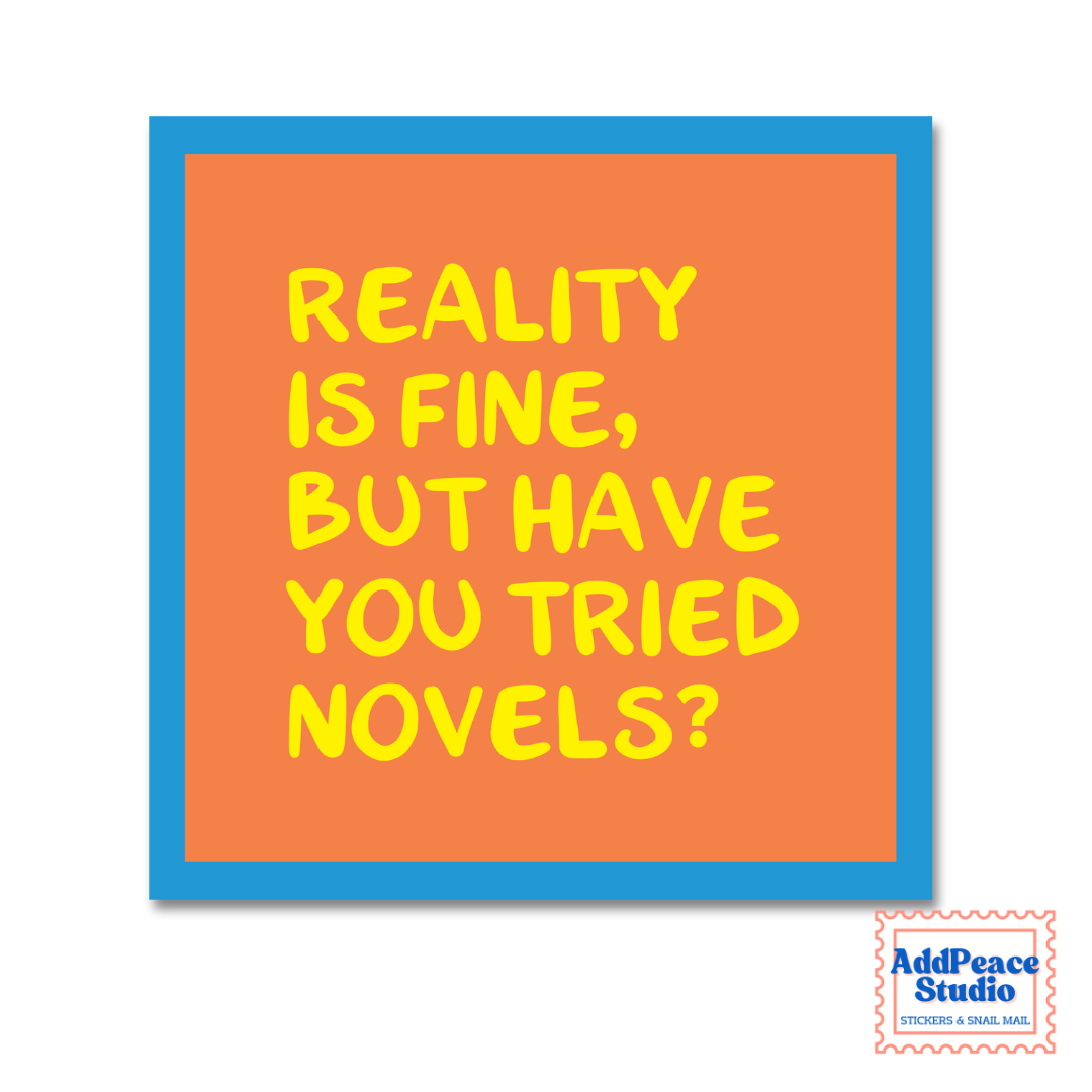 A square sticker with a bright orange center, a blue border, and yellow text that reads 'REALITY IS FINE, BUT HAVE YOU TRIED NOVELS?'. A small 'AddPeace Studio' logo appears in the bottom right corner.