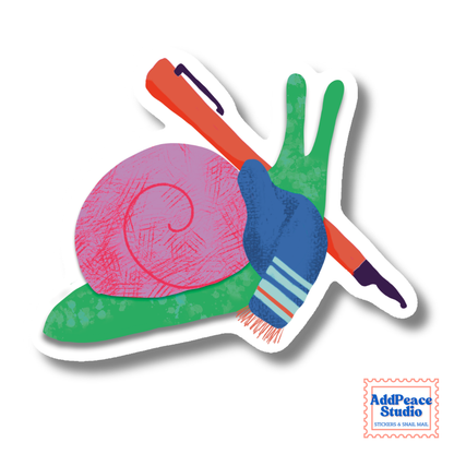 A die-cut sticker featuring a stylized snail with a pink shell and green body, holding a red fountain pen, shown on a white background with a small AddPeace Studio logo in the bottom right corner.