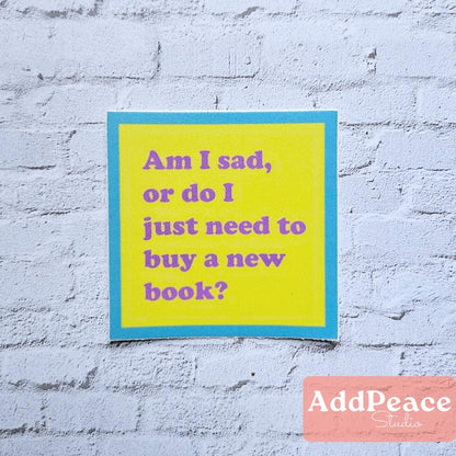 Yellow sticker with text on a textured white wall, featuring the brand 'AddPeace'.